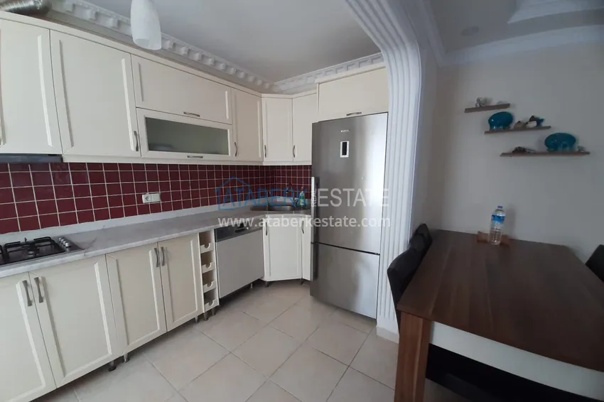 Kupuj  Apartament 2+1 w Alanya, dzielnica Mahmutlar — z meblami, przeszklonymi balkonami w pobliżu Yekta Mall 6 