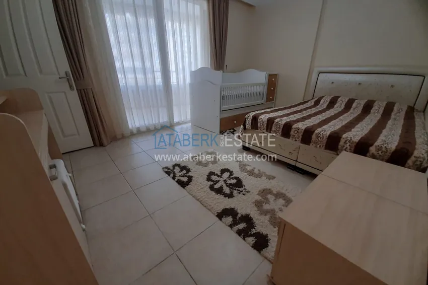 Kupuj  Apartament 2+1 w Alanya, dzielnica Mahmutlar — z meblami, przeszklonymi balkonami w pobliżu Yekta Mall 7 