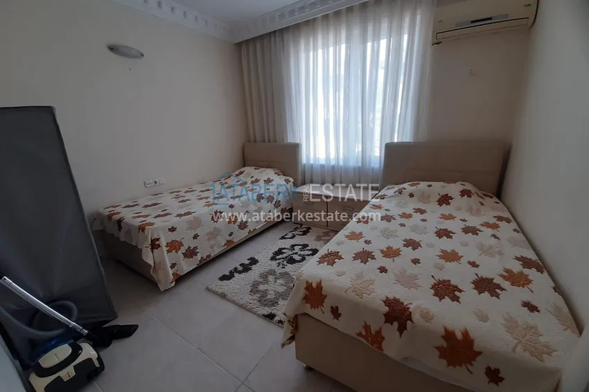 Kupuj  Apartament 2+1 w Alanya, dzielnica Mahmutlar — z meblami, przeszklonymi balkonami w pobliżu Yekta Mall 9 