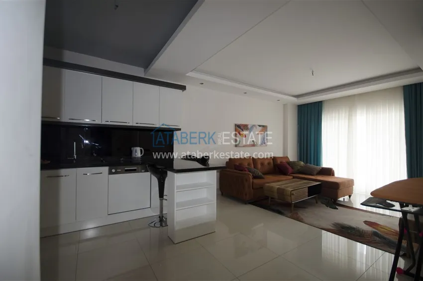 Kupuj  Apartament 1+1 z widokiem na morze w Tosmur — 300 metrów od plaży. Nieruchomość na zezwolenie na pobyt w Alanyi 1 