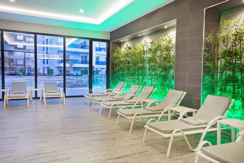 Apartament 1+1 z widokiem na morze w Tosmur — 300 metrów od plaży. Nieruchomość na zezwolenie na pobyt w Alanyi 21 