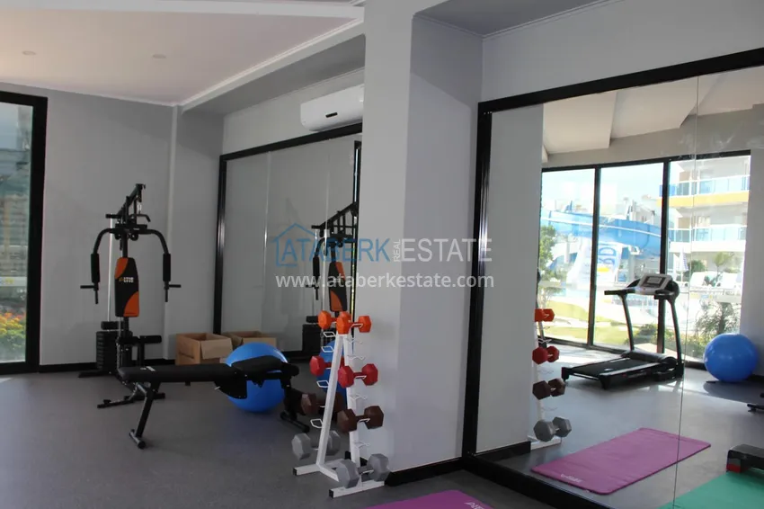 Apartament 1+1 z widokiem na morze w Tosmur — 300 metrów od plaży. Nieruchomość na zezwolenie na pobyt w Alanyi 23 