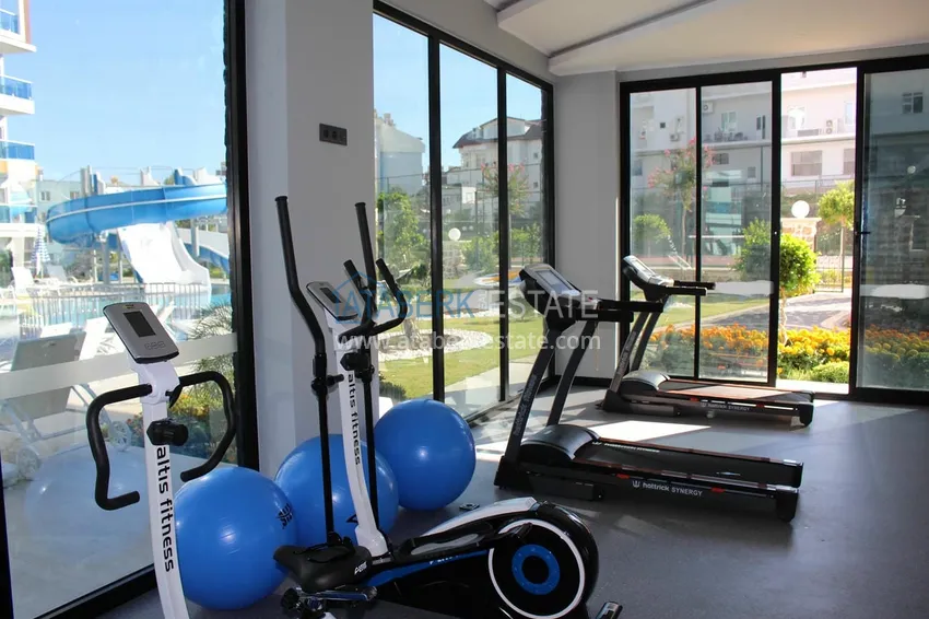 Apartament 1+1 z widokiem na morze w Tosmur — 300 metrów od plaży. Nieruchomość na zezwolenie na pobyt w Alanyi 24 