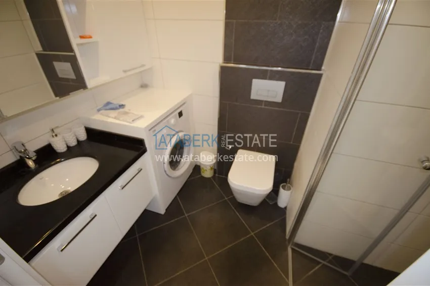 Kupuj  Apartament 1+1 z widokiem na morze w Tosmur — 300 metrów od plaży. Nieruchomość na zezwolenie na pobyt w Alanyi 7 