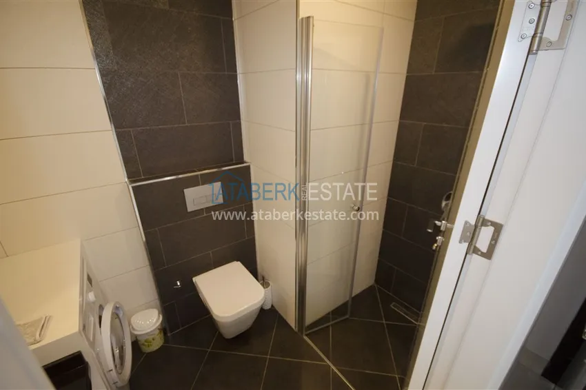 Kupuj  Apartament 1+1 z widokiem na morze w Tosmur — 300 metrów od plaży. Nieruchomość na zezwolenie na pobyt w Alanyi 8 