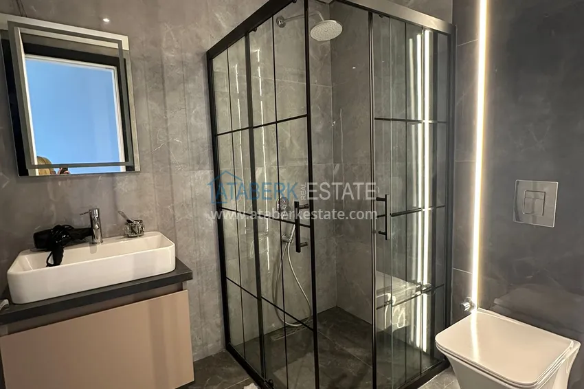 Kupuj  Apartament 2+1 z panoramicznym widokiem i częściowo umeblowany — Alanya, Mahmutlar 19 