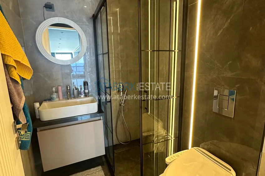Kupuj  Apartament 2+1 z panoramicznym widokiem i częściowo umeblowany — Alanya, Mahmutlar 21 