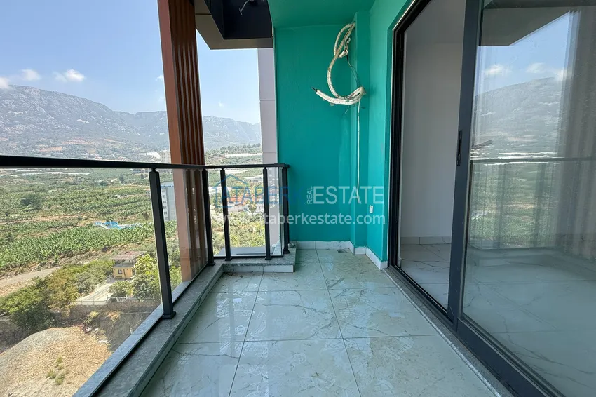 Kupuj  1+1 apartamenty w nowoczesnym kompleksie - dzielnica Mahmutlar, Alanya 10 