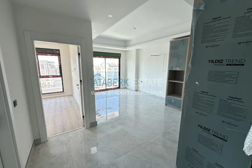 Kupuj  Nowoczesny apartament 1+1 w Alanya, dzielnica Mahmutlar - z pięknym wykończeniem  1 