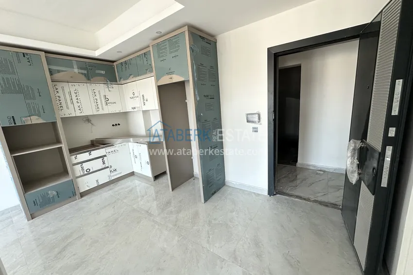 Kupuj  Nowoczesny apartament 1+1 w Alanya, dzielnica Mahmutlar - z pięknym wykończeniem  2 