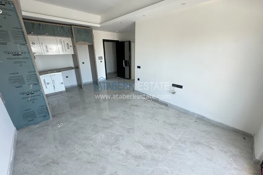 Kupuj  Nowoczesny apartament 1+1 w Alanya, dzielnica Mahmutlar - z pięknym wykończeniem  3 
