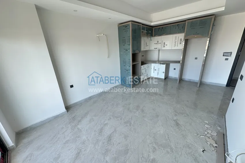 Kupuj  Nowoczesny apartament 1+1 w Alanya, dzielnica Mahmutlar - z pięknym wykończeniem  4 