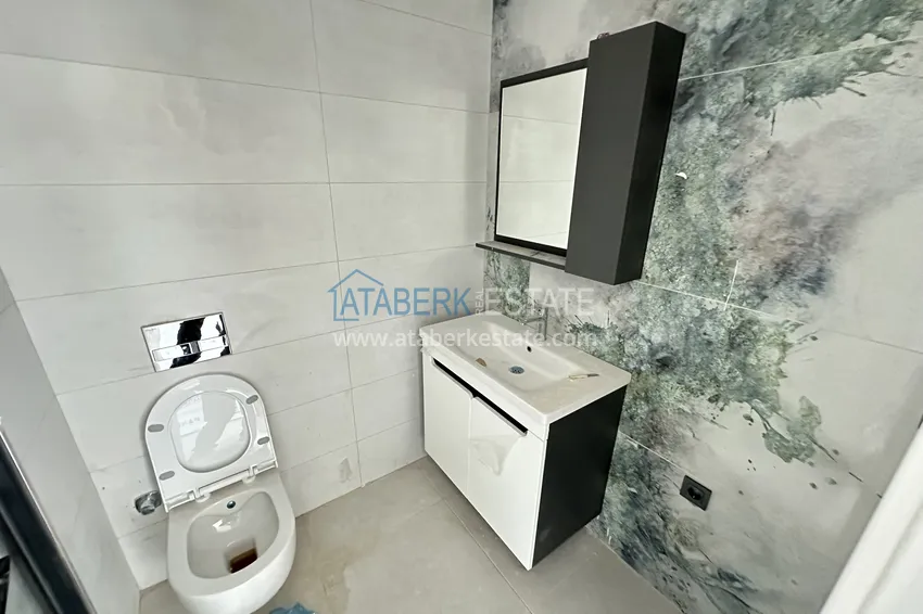 Kupuj  Nowoczesny apartament 1+1 w Alanya, dzielnica Mahmutlar - z pięknym wykończeniem  8 