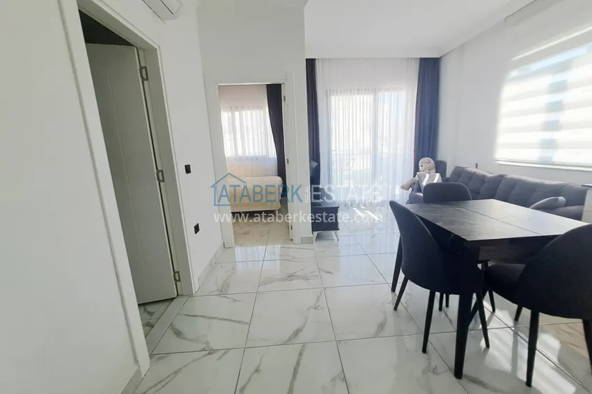 Kupuj  Apartament pod klucz 1+1 w Alanyi, dzielnica Oba — nieruchomość na zezwolenie na pobyt  5 
