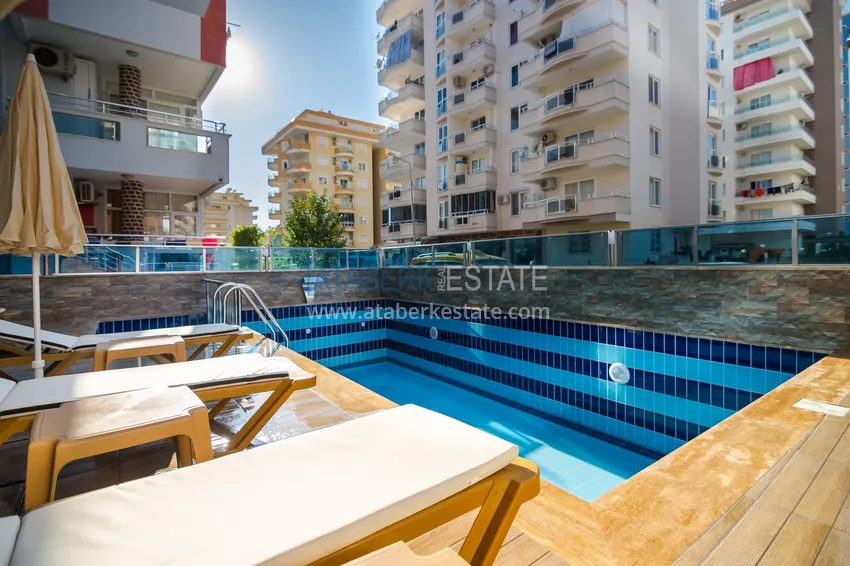 Apartament 2+1 z meblami i częściowym widokiem na morze — Alanya, dzielnica Mahmutlar  8 