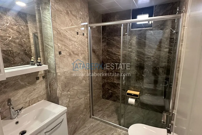 Kupuj  Apartament 2+1 z meblami i częściowym widokiem na morze — Alanya, dzielnica Mahmutlar  11 