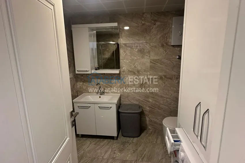 Kupuj  Apartament 2+1 z meblami i częściowym widokiem na morze — Alanya, dzielnica Mahmutlar  12 