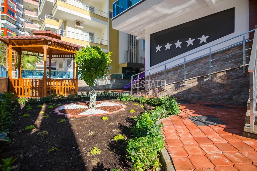 Apartament 2+1 z meblami i częściowym widokiem na morze — Alanya, dzielnica Mahmutlar  11 