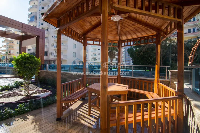 Apartament 2+1 z meblami i częściowym widokiem na morze — Alanya, dzielnica Mahmutlar  12 