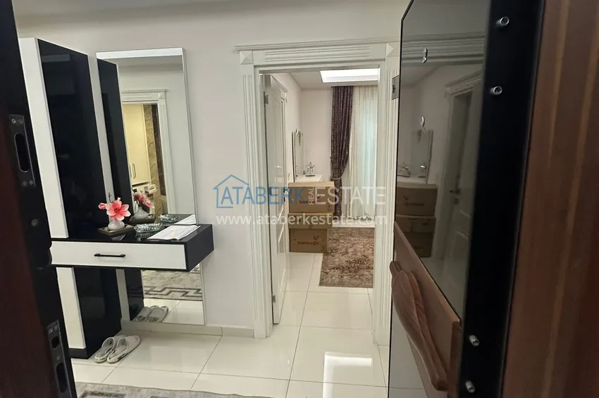 Kupuj  Apartament 2+1 z meblami i częściowym widokiem na morze — Alanya, dzielnica Mahmutlar  1 