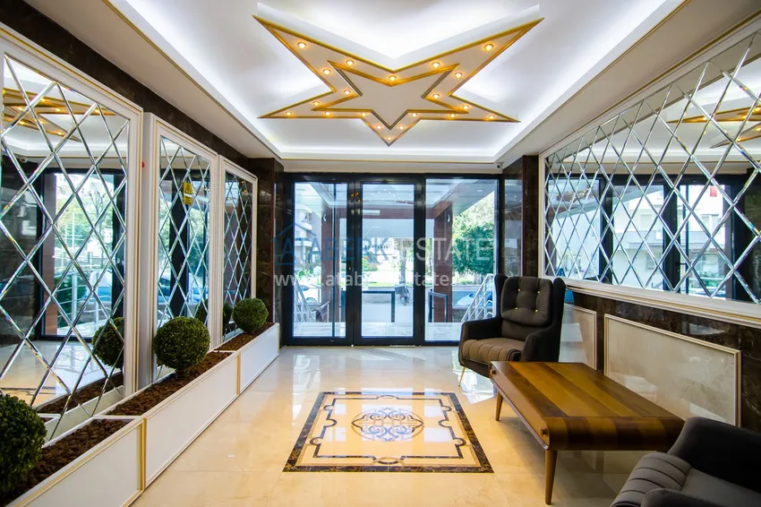 Apartament 2+1 z meblami i częściowym widokiem na morze — Alanya, dzielnica Mahmutlar  18 
