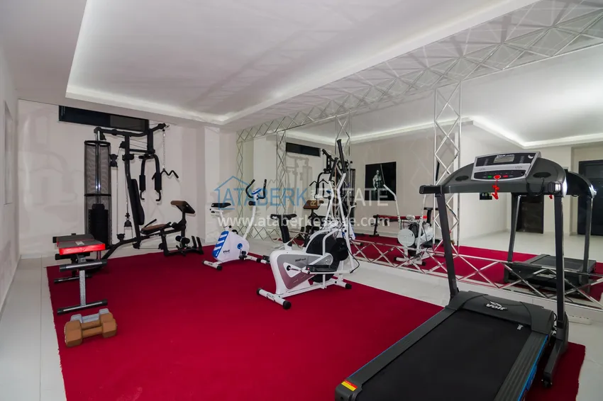 Apartament 2+1 z meblami i częściowym widokiem na morze — Alanya, dzielnica Mahmutlar  24 