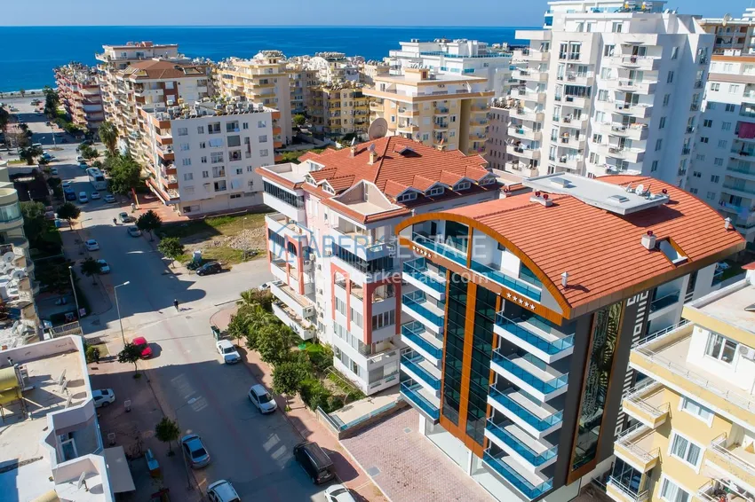 Apartament 2+1 z meblami i częściowym widokiem na morze — Alanya, dzielnica Mahmutlar  2 