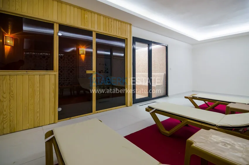 Apartament 2+1 z meblami i częściowym widokiem na morze — Alanya, dzielnica Mahmutlar  28 