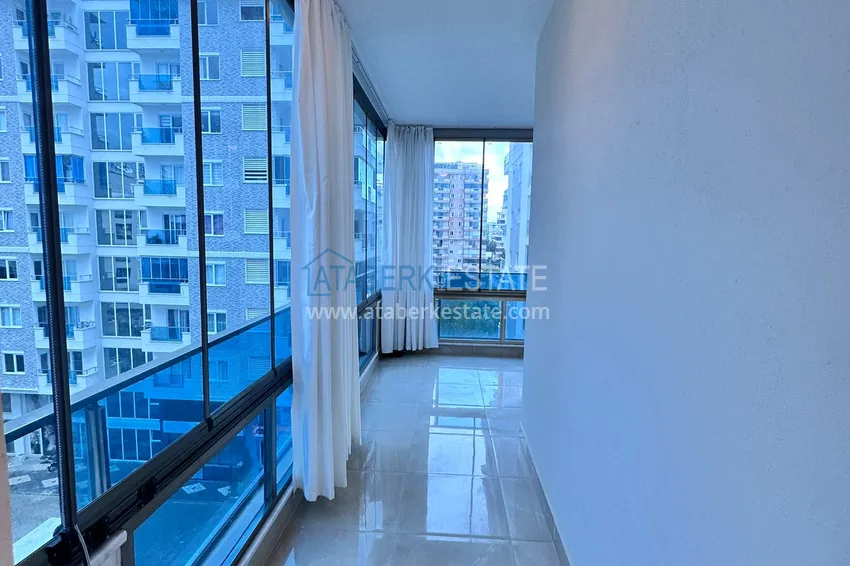 Kupuj  Apartament 1+1 81 m2 z przeszklonym balkonem w Mahmutlar — opcja pod klucz  15 