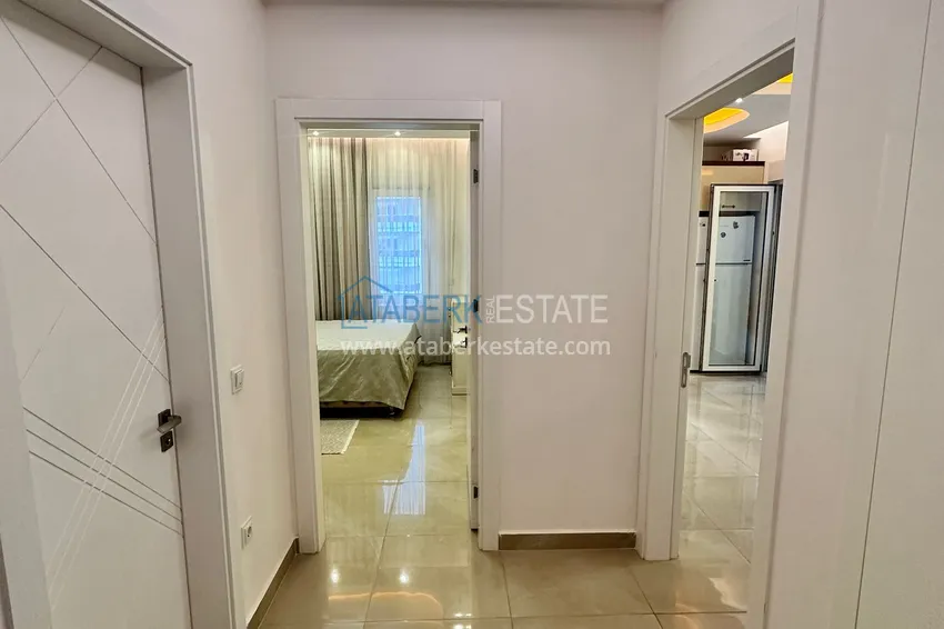 Kupuj  Apartament 1+1 81 m2 z przeszklonym balkonem w Mahmutlar — opcja pod klucz  16 