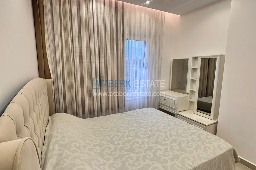 Kupuj  Apartament 1+1 81 m2 z przeszklonym balkonem w Mahmutlar — opcja pod klucz  18 