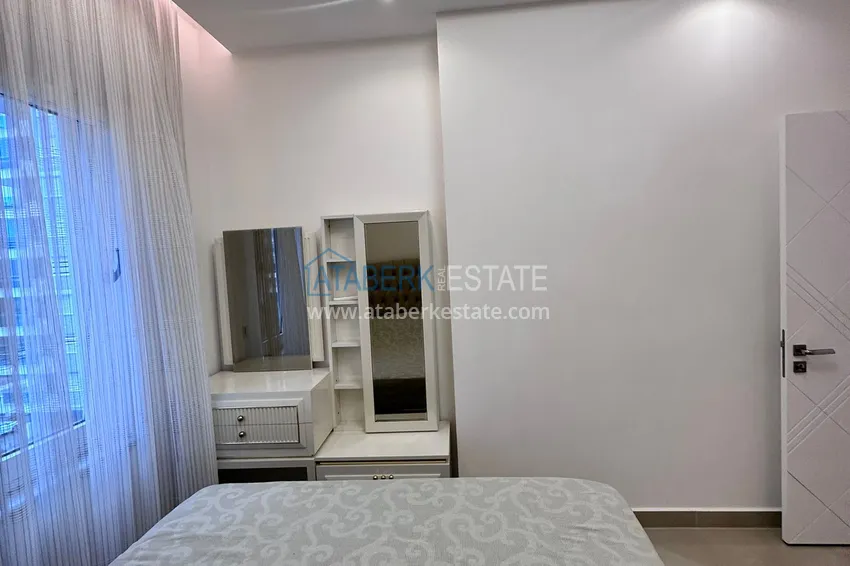 Kupuj  Apartament 1+1 81 m2 z przeszklonym balkonem w Mahmutlar — opcja pod klucz  19 