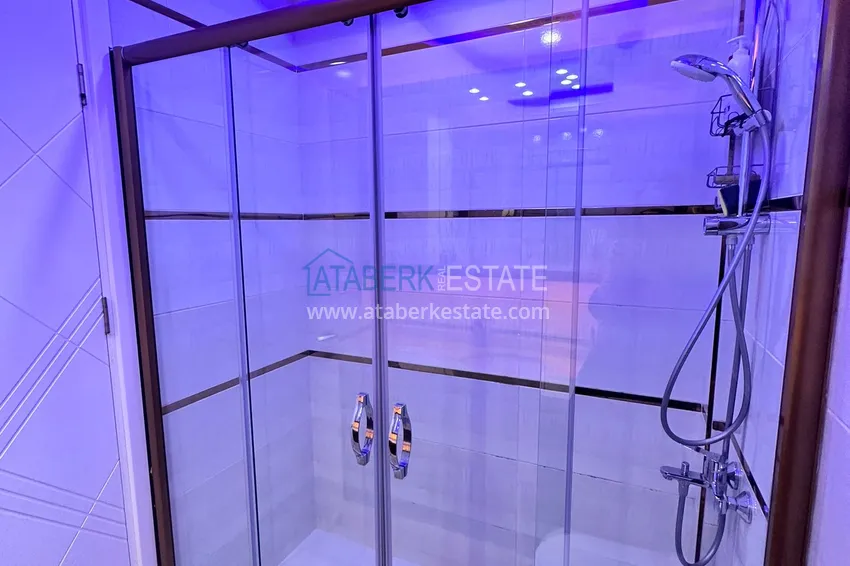 Kupuj  Apartament 1+1 81 m2 z przeszklonym balkonem w Mahmutlar — opcja pod klucz  23 