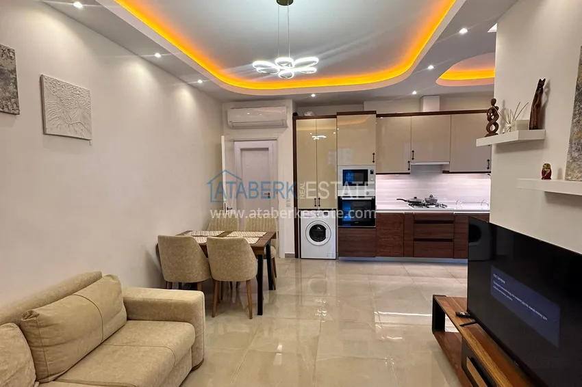 Kupuj  Apartament 1+1 81 m2 z przeszklonym balkonem w Mahmutlar — opcja pod klucz  5 