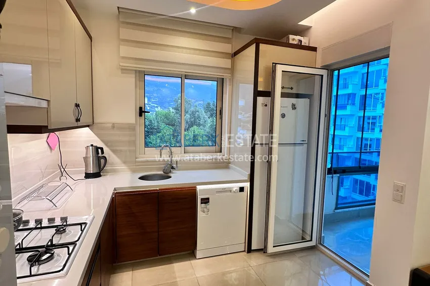 Kupuj  Apartament 1+1 81 m2 z przeszklonym balkonem w Mahmutlar — opcja pod klucz  10 