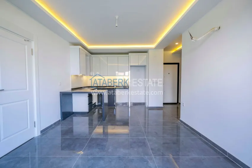 Kupuj  Nowy apartament 2+1 w Mahmutlar — w centrum dzielnicy, zaledwie 300 m od morza 1 