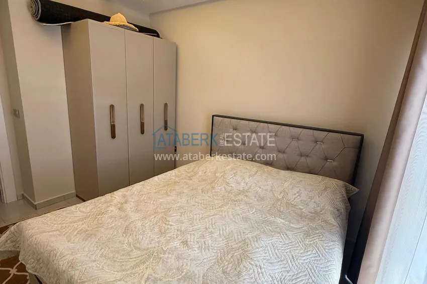 Kupuj  Apartament 1+1 umeblowany od właściciela w Mahmutlar — kompleks mieszkalny z obsługą hotelową i prywatną plażą 11 