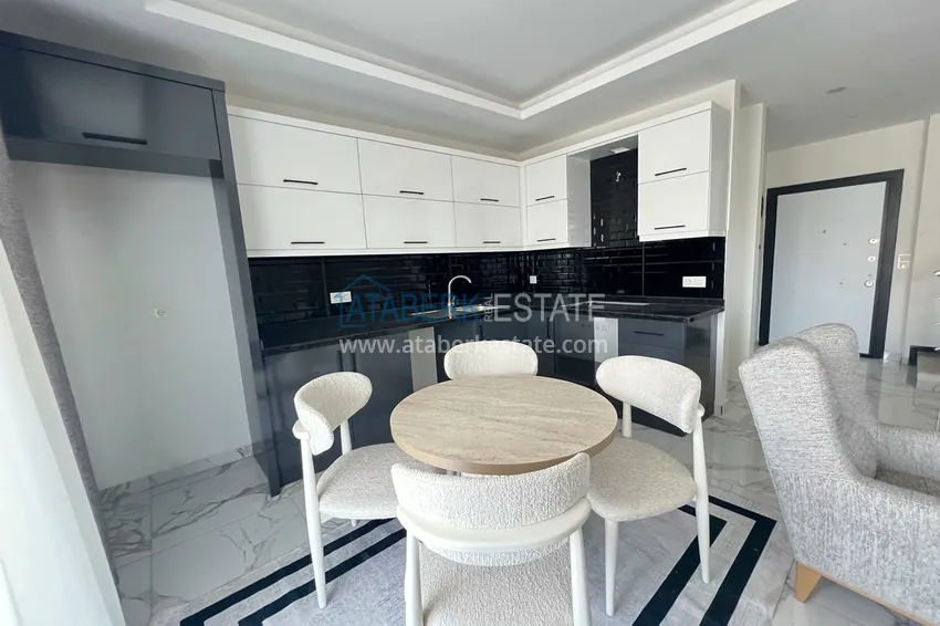 Kupuj  Apartament 1+1 w Alanyi, Kargicak, drugi nadmorski. Nadaje się do wynajmu krótkoterminowego  34 