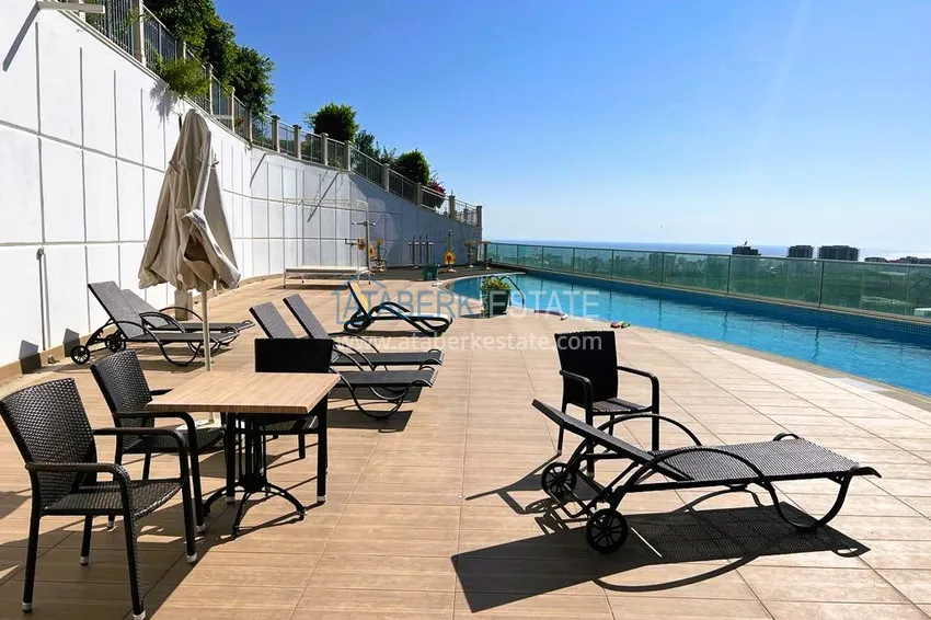 Apartament 2+1 z panoramicznym widokiem na morze i przyrodę w Mahmutlar — w kompleksie premium 10 