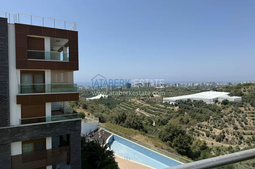 Kupuj  Apartament 2+1 z panoramicznym widokiem na morze i przyrodę w Mahmutlar — w kompleksie premium 12 