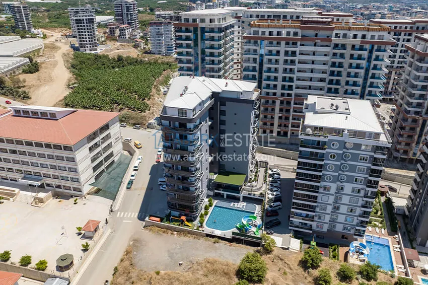 Apartament 1+1 w centrum Mahmutlar — nowoczesny komfort i panoramiczne widoki 1 