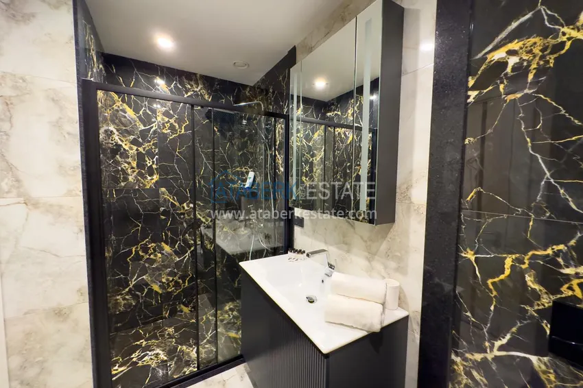 Apartament 3+1 XL w Turkler — do inwestycji i rekreacji w kompleksie hotelowym premium 78 