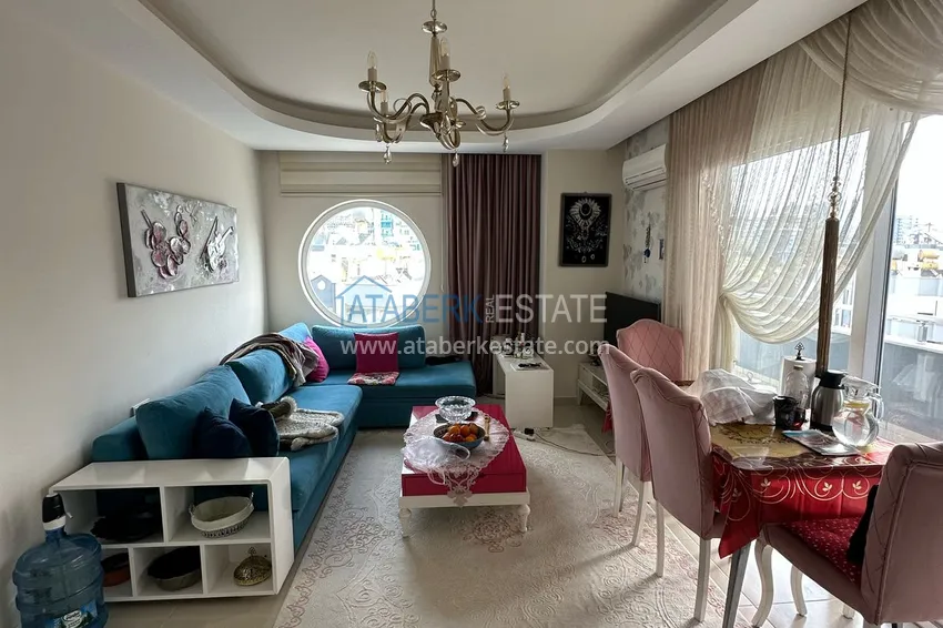 Kupuj  Apartament 1+1 z widokiem na morze i góry w Mahmutlar — 300 od morza, sprzedaż od właściciela 12 