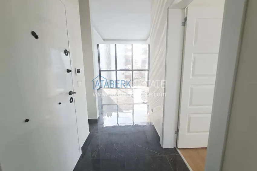 Kupuj Apartament 1+1 w centrum Mahmutlar to dobre połączenie lokalizacji i komfortu 1 