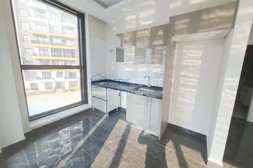 Kupuj Apartament 1+1 w centrum Mahmutlar to dobre połączenie lokalizacji i komfortu 5 
