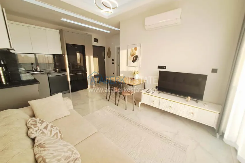 Kupuj  Apartament 1+1 w Alanyi, dzielnica Oba z meblami i widokiem na góry — raty do 6 miesięcy  1 