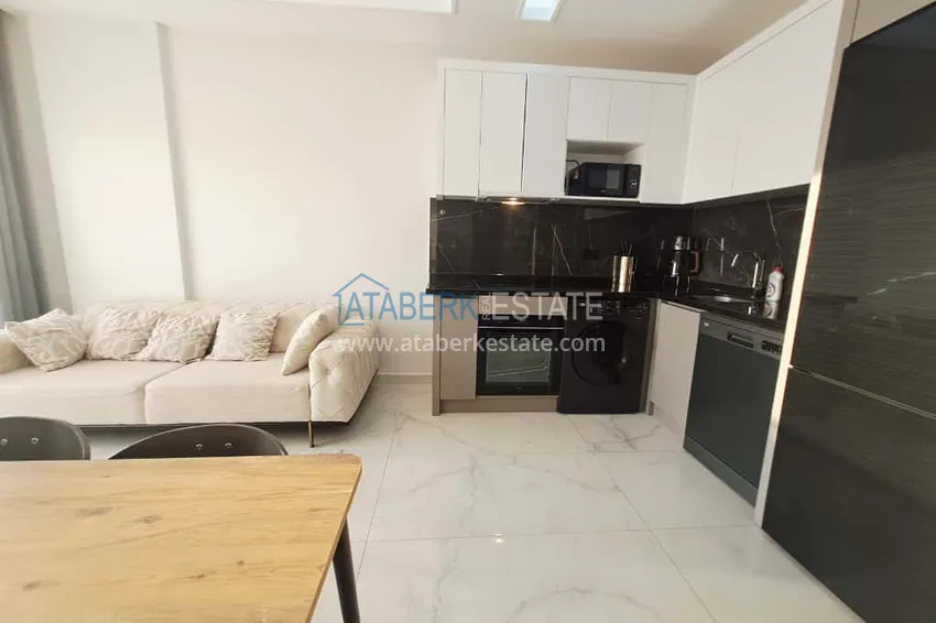 Kupuj  Apartament 1+1 w Alanyi, dzielnica Oba z meblami i widokiem na góry — raty do 6 miesięcy  2 
