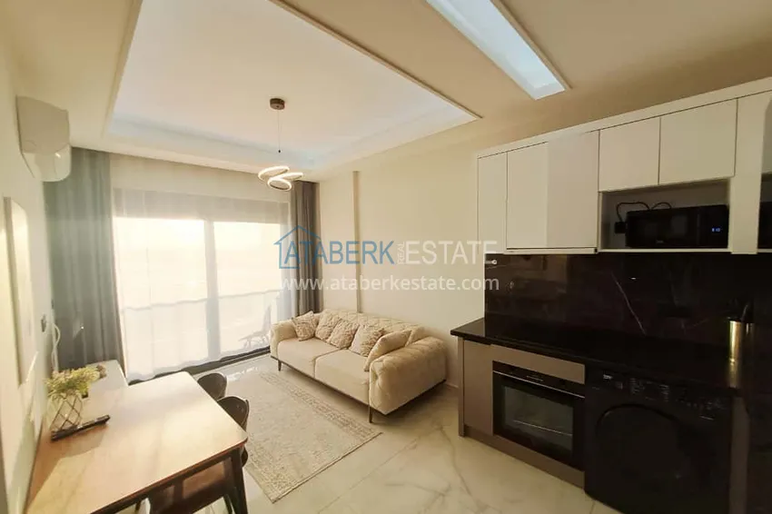 Kupuj  Apartament 1+1 w Alanyi, dzielnica Oba z meblami i widokiem na góry — raty do 6 miesięcy  3 