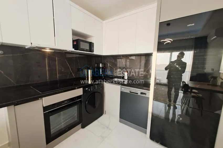 Kupuj  Apartament 1+1 w Alanyi, dzielnica Oba z meblami i widokiem na góry — raty do 6 miesięcy  4 