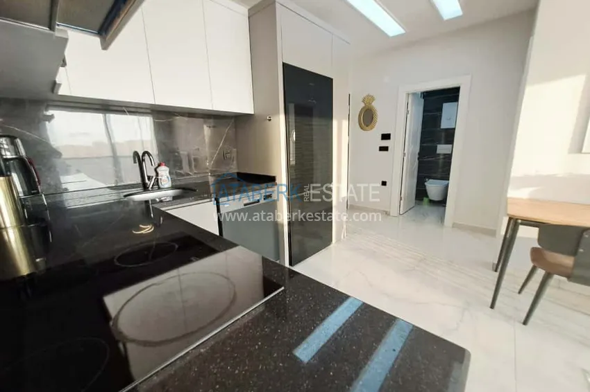 Kupuj  Apartament 1+1 w Alanyi, dzielnica Oba z meblami i widokiem na góry — raty do 6 miesięcy  5 